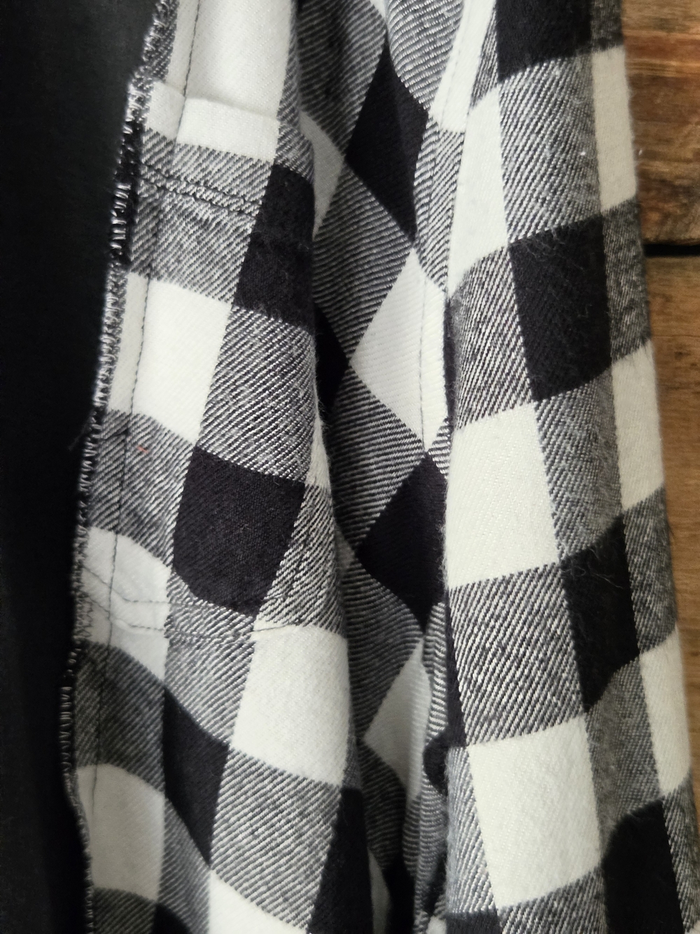 Upcycled Black Graphic Tee with Black-and-White Plaid Sleeve - Picture 6 of 7